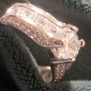 Engagement Ring Round vintage style cubic zirconia princess cut cz side stones.